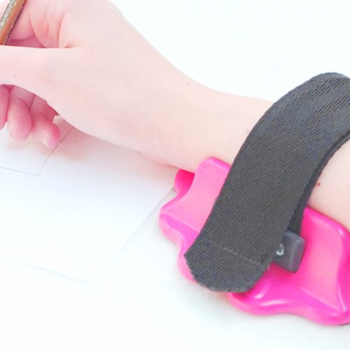 Posicionador de brazos para escribir rosa